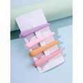 Nobrand - Kit Clips de Cabelo Curvos 7cm Tons Pastel (4 Peças)